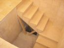 The bor (pit area) of the Mikvah.   The wooden braces were installed while the wall tile was completed and will be removed.  The second bor is visible through the braces. (24 July 2005)